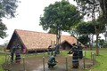 Cảnh giã gạo nuôi quân được phục dựng khu bảo tồn văn hoá S’ tiêng(Bình Phước). Ảnh: Trần Mai Hưởng-TTXVN