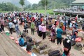 Khu vực chợ lợn tại Chợ phiên San Thàng (Lai Châu) nhộn nhịp người bán, người mua. Ảnh: Nguyễn Oanh – TTXVN