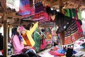 Một gian hàng bán trang phục truyền thống của người Mông. Ảnh: Nguyễn Oanh-TTXVN
