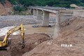 Cầu Khỉ được triển khai sửa chữa, dự kiến hoàn thành trước mùa mưa năm nay. Ảnh: Đoàn Hữu Trung-TTXVN