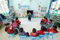 Một buổi học lớp ghép 2 + 3 + 4 tuổi của điểm trường Lũng Slàng thuộc trường Mầm non xã Tri Phương (Tràng Định, Lạng Sơn) với 10 học sinh đều là dân tộc Dao. Ảnh: TTXVN phát