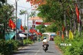 “Đường cờ Tổ quốc” tại xã Trường Xuân A, huyện Thới Lai (Cần Thơ) vừa mới khánh thành. Ảnh: TTXVN phát