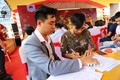 Người dân đăng ký đặt cọc mua nhà ở xã hội tại phường 2, thành phố Tây Ninh (Tây Ninh). Ảnh: Thanh Tân - TTXVN