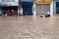 Trung tâm thị trấn La Hai (huyện Đồng Xuân) nước lũ ngập phổ biến từ 1m đến 2,5m. Ảnh: Xuân Triệu - TTXVN