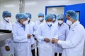 Chủ tịch nước Nguyễn Xuân Phúc thăm và làm việc tại Công ty cổ phần công nghệ sinh học dược Nanogen. Ảnh: Thống Nhất – TTXVN