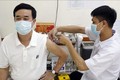 Tiêm vaccine phòng COVID-19 cho người dân tại điểm tiêm Trường THCS Trưng Vương, quận Hoàn Kiếm, ngày 3/8/2021. Ảnh: Trần Việt – TTXVN