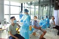 Hoạt động tiêm vaccine phòng COVID -19 tại một điểm tiêm chủng trên địa bàn thành phố Vĩnh Yên. Ảnh: Hoàng Hùng - TTXVN