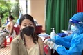 Người dân phường Trần Phú, thành phố Quy Nhơn tiêm vaccine ngừa COVID-19, chiều 28/9. Ảnh: Nguyên Linh-TTXVN