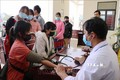 Khám sàng lọc trước khi tiêm vaccine ngừa COVID-19 cho người dân xã Tà Tổng (Mường Tè, Lai Châu). Ảnh: Việt Hoàng - TTXVN