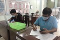 Người lao động làm thủ tục đề nghị hỗ trợ thất nghiệp do ảnh hưởng bởi đại dịch COVID-19 tại Bảo hiểm xã hội tỉnh Bình Định. Ảnh: Nguyên Linh-TTXVN