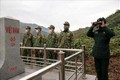 Bộ đội Biên phòng Đồn Huổi Luông, tỉnh Lai Châu, tuần tra tại khu vực cột mốc biên giới. Ảnh: TTXVN phát.