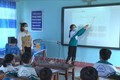 Học sinh Trường tiểu học Trần Phú, xã Tân An, huyện Đăk Pơ trong giờ tại phòng học thông minh. Ảnh: Hoài Nam - TTXVN