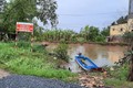 Một hồ có cắm biển cảnh báo phòng, chống đuối nước ở huyện Cư M’gar. Ảnh: Hoài Thu – TTXVN