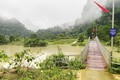 Mưa lớn khiến nước sông ở khu vực xã Thượng Hóa, huyện Minh Hóa, Quảng Bình dâng cao, gây ngập lụt. Ảnh: TTXVN phát