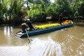 Ghe hoa trên dòng kênh thuộc xã Vĩnh Viễn, huyện Long Vỹ, tỉnh Hậu Giang. Ảnh: Duy Khương 
