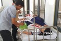 9 em học sinh đang được chăm sóc và theo dõi tại Trung Tâm Y tế Đồng Xoài. Ảnh: Đậu Tất Thành – TTXVN.