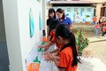 Các em học sinh Trường Tiểu học Thành Long, xã Thành Long, huyện Hàm Yên, tỉnh Tuyên Quang sử dụng nhà vệ sinh được xây mới. Ảnh: Quang Cường – TTXVN