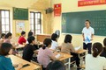 Cán bộ bảo hiểm xã hội tuyên truyền chính sách, pháp luật về bảo hiểm y tế cho cán bộ, giáo viên tại các trường học ở huyện Gia Viễn, tỉnh Ninh Bình. Ảnh: Thùy Dung - TTXVN