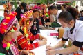Quân y Bộ đội Biên phòng tỉnh Lai Châu khám chữa bệnh cho bà con tại bản Thò Ma, xã Pa Vệ Sủ trong chương trình. Ảnh: Nguyễn Oanh-TTXVN