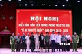 Ban Giám đốc Công an tỉnh Sơn La chụp ảnh lưu niệm với các đại biểu và các điển hình tiên tiến tại Hội nghị. Ảnh: Nguyễn Cường- TTXVN.