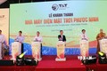 Các đại biểu thực hiện nghi thức khánh thành Nhà máy điện mặt trời Phước Ninh. Ảnh: Công Thử - TTXVN