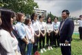 Phó Thủ tướng, Bộ trưởng Bộ Ngoại giao Phạm Bình Minh trao đổi với sinh viên Đại học quốc gia Thành phố Hồ Chí Minh. Ảnh: Thu Hoài - TTXVN