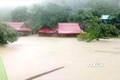 Hơn 57.000 ngôi nhà của các hộ dân trên địa bàn tỉnh Quảng Bình bị ngập sâu vì lũ lớn kỷ lục. Ảnh: TTXVN phát