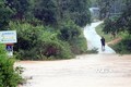 Nước trên các sông suối dâng cao làm đường vào làng Mô Pả, xã Đăk Hà, huyện Tu Mơ Rông bị chia cắt. Ảnh: Cao Nguyên-TTXVN