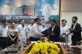 Lễ ký kết hợp tác triển khai đăng ký khám bệnh trực tuyến tại Bệnh viện đa khoa Đồng Nai. Ảnh: Lê Xuân-TTXVN