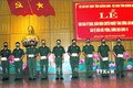 Lễ bàn giao 42 cán bộ sỹ quan, quân nhân chuyên nghiệp thuộc Bộ Chỉ huy Quân sự tỉnh cho Bộ Chỉ huy Bộ đội Biên phòng tỉnh Quảng Nam. Ảnh: Trần Tĩnh - TTXVN