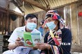 Cán bộ y tế Trạm Y tế xã Huổi Luông, huyện Phong Thổ, tỉnh Lai Châu xuống các bản tuyên truyền cho bà con về chính sách y tế, phòng chống bệnh tật. Ảnh: Nguyễn Oanh-TTXVN