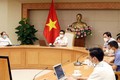 Phó Thủ tướng Vũ Đức Đam chủ trì họp trực tuyến giữa Thường trực Ban Chỉ đạo Quốc gia phòng, chống dịch COVID-19 với lãnh đạo tỉnh Bắc Ninh và Bắc Giang. Ảnh: Phạm Kiên - TTXVN