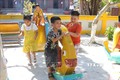 Trẻ em vui chơi trong ngày nghỉ hè. Ảnh: Sỹ Tuyên - TTXVN