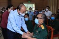 Chủ tịch nước Nguyễn Xuân Phúc thăm hỏi và tặng quà cho thương bệnh binh tại Trung tâm nuôi dưỡng bệnh binh nặng và Điều dưỡng Người có công tỉnh Hà Nam. Ảnh: Thống Nhất -TTXVN