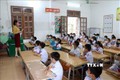 Học sinh tại trường Tiểu học Chiềng Lề, thành phố Sơn La nghe giáo viên phổ biến các nội dung chuẩn bị cho năm học mới. Ảnh: Hữu Quyết - TTXVN
