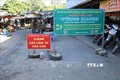 Chốt kiểm soát “vùng xanh” tại chợ Thanh Sơn (phường Thanh Sơn, thành phố Phan Rang – Tháp Chàm). Ảnh: Nguyễn Thành – TTXVN
