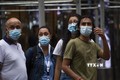 Người dân đeo khẩu trang phòng dịch COVID-19 tại New York, Mỹ. Ảnh: AFP/TTXVN
