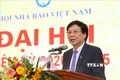 Ông Hồ Quang Lợi, Phó Chủ tịch Thường trực Hội Nhà báo Việt Nam báo cáo tóm tắt Đề án về phương án nhân sự nhiệm kỳ 2020-2025. Ảnh: Tuấn Đức - TTXVN
