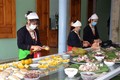 Người Dao xã Cẩm Liên, huyện Cẩm Thủy, Thanh Hóa nấu nướng để sử dụng trong lễ đón tết năm cùng. Ảnh: Nguyễn Nam-TTXVN

