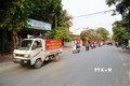 Phường Tân Hà, thành phố Tuyên Quang ra quân tuyên truyền cổ động bầu cử trên các tuyến phố. Ảnh: Nam Sương – TTXVN
