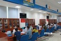 Khu vực tiếp nhận hồ sơ giải quyết thủ tục hành chính của BHXH tỉnh Cà Mau tại Trung tâm giải quyết thủ tục hành chính tỉnh Cà Mau. Ảnh: Minh Hưng - TTXVN
