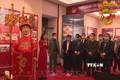Các đại biểu cắt băng trưng bày giới thiệu về Tín ngưỡng thờ mẫu Tam phủ của người Việt tại Bảo tàng tỉnh Vĩnh Phúc. Ảnh: Nguyễn Thảo - TTXVN
