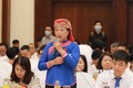 Bà Hoàng Thị Chắp, nông dân sản xuất giỏi của Hội Nông dân tỉnh Lào Cai phát biểu tham luận về lĩnh vực nuôi thuỷ sản. Ảnh:vũ Sinh - TTXVN
