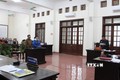 Kiểm sát viên đọc bản luận tội đối với hai bị cáo Bàn Thị Quý và Sùng A Sua. Ảnh: Vũ Hà- TTXVN
