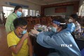 Tiêm vaccine mũi 3 phòng COVID-19 tại thành phố Vị Thanh, tỉnh Hậu Giang. Ảnh: Hồng Dân – TTXVN
