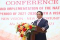 Thủ tướng Phạm Minh Chính đến dự Hội nghị công bố và triển khai Quy hoạch tổng thể quốc gia thời kỳ 2021-2030. Ảnh: Dương Giang-TTXVN
