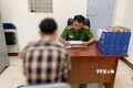 Cơ quan Công an huyện Ea H’leo, tỉnh Đắk Lắk làm việc với N.C.C. Ảnh: TTXVN phát
