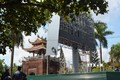 Công trình bảng quảng cáo “khủng” không phép nằm một phần trong khu vực bảo vệ 1 của di tích Tháp chuông Thành cổ Quảng Trị. Ảnh: Nguyên Lý - TTXVN