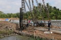 UBND huyện Cù Lao Dung đầu tư xây dựng khu tái định cư cho người dân giải phóng mặt bằng cầu Đại Ngãi. Ảnh: Tuấn Phi-TTXVN