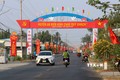 Cổng chào huyện nông thôn mới An Biên. Ảnh: Lê Huy Hải - TTXVN